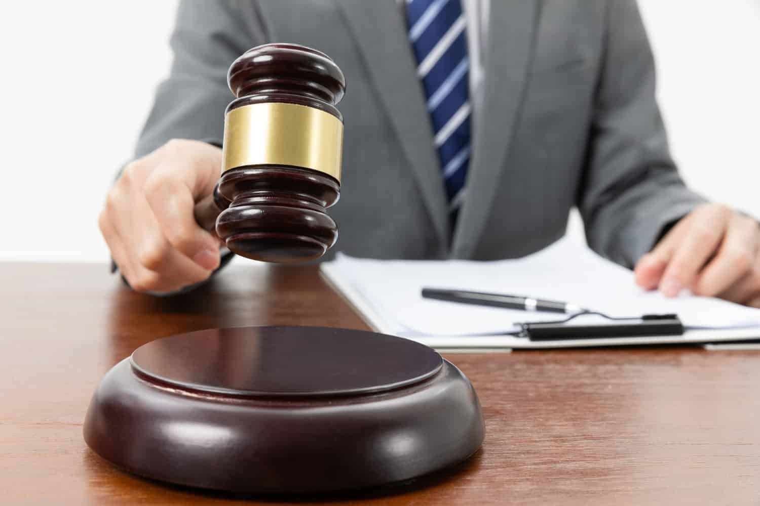 person with gavel car accident injury claim